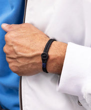 Load image into Gallery viewer, Model wearing Pig & Hen Don Dino in Black/Black.