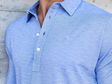Load image into Gallery viewer, Model wearing Criquet - Brrr Long Sleeve Range Polo in Lapis Blue.