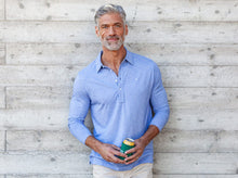 Load image into Gallery viewer, Model wearing Criquet - Brrr Long Sleeve Range Polo in Lapis Blue.