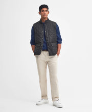 Load image into Gallery viewer, Model wearing Barbour New Lowerdale Quilted Gilet in Black.