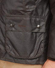 Load image into Gallery viewer, Model wearing Barbour Bedale Wax Jacket in Rustic.