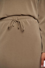 Load image into Gallery viewer, Model wearing Rino & Pelle - Sandy Neoprene/Scuba Skirt in Dark Khaki.