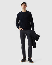 Load image into Gallery viewer, Model wearing Rodd & Gunn - Motion Melange Straight Fit Jean in Navy.