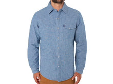 Load image into Gallery viewer, Model wearing Criquet - Quilted Shacket in Light Blue Chambray.