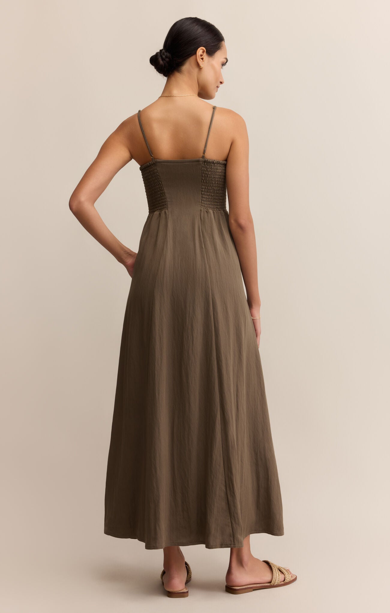 Model wearing ZSupply Angel Eyes Midi Dress in Tiki - back.