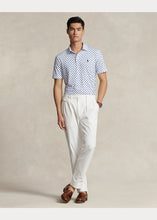 Load image into Gallery viewer, Model wearing POLO Ralph Lauren - Classic Fit Performance Polo Shirt in Preppy Woodblock.