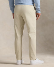 Load image into Gallery viewer, Model wearing RLX - Ralph Lauren Performance Pant in Sand - back.