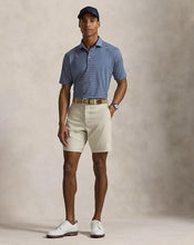 Load image into Gallery viewer, Model wearing RLX - Ralph Lauren 9-Inch Tailored Fit Performance Short in Basic Sand.