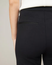 Load image into Gallery viewer, Model wearing Spanx - The Perfect Pant, Hi-Rise Flare in Classic Black 20252R - back.