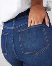 Load image into Gallery viewer, Model wearing Spanx - Flare Jeans in Midnight Shade.