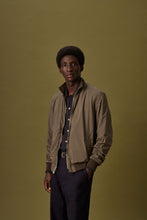 Load image into Gallery viewer, Model wearing Valstar - Reversible Zip Valstarino in Muschio.