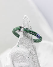 Load image into Gallery viewer, Pig & Hen Vicious Vik Bracelet in green and light gray with silver buckle.