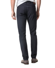 Load image into Gallery viewer, Model wearing Rodd & Gunn Motion 2 Straight Jean RL Navy.