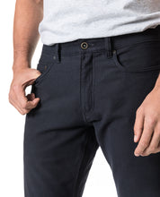 Load image into Gallery viewer, Model wearing Rodd & Gunn Motion 2 Straight Jean RL Navy.