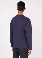 Load image into Gallery viewer, Model wearing Sunspel - Riviera LS Crew Neck Supima Cotton T-shirt in Navy - back.