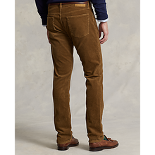 Load image into Gallery viewer, Model wearing Polo Ralph Lauren - Varick Slim Straight Stretch Corduroy 5-Pocket Pant in Sepia - back.