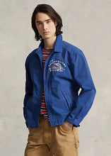 Load image into Gallery viewer, Model wearing POLO Ralph Lauren - Ralph's Marina Poplin Jacket in Vineyard Royal.