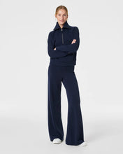 Load image into Gallery viewer, Model Wearing Spanx - Air Essentials Wide Leg Pant - Timeless Navy.
