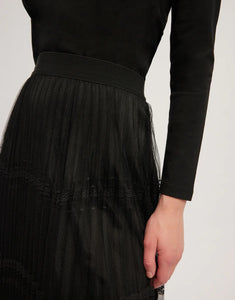 Model wearing Leo & Ugo - Beatice Skirt in Black.