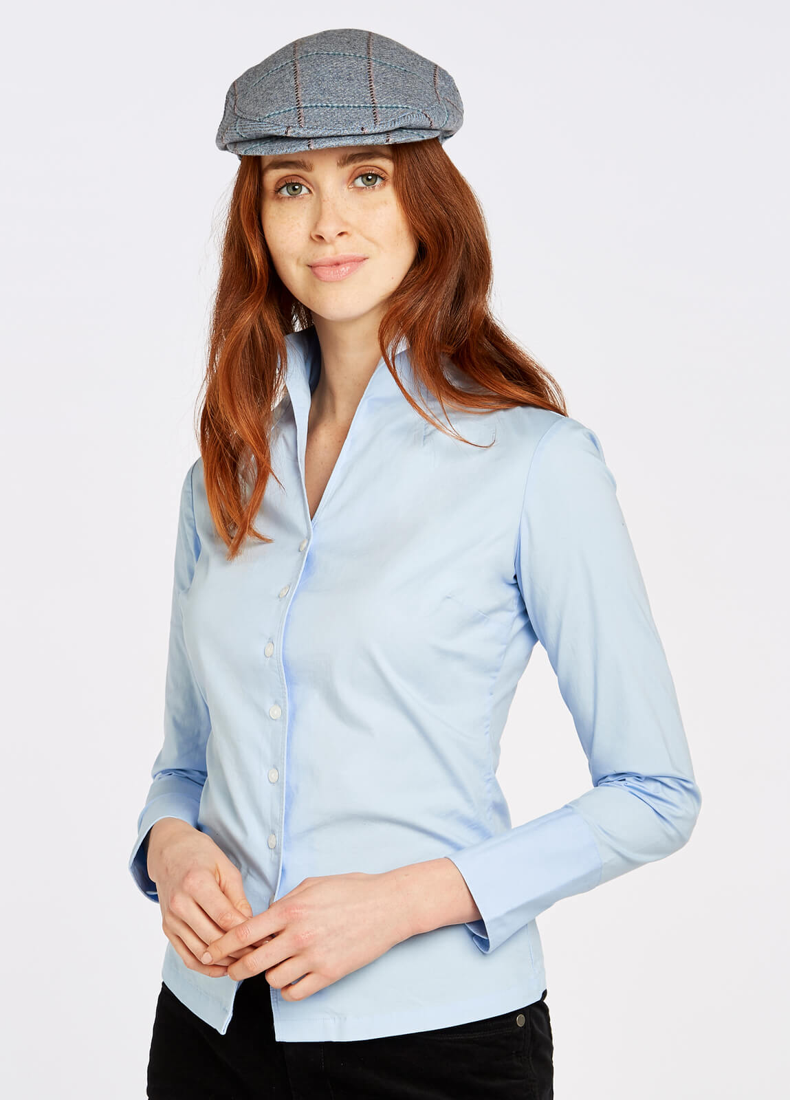 Model wearing Dubarry Snowdrop Long Sleeve Button Down in Pale Blue.
