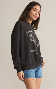 Model wearing ZSupply - Bronco Sunday Sweatshirt in Black Sand.