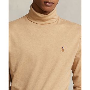 Model wearing POLO Ralph Lauren - L/S Soft Touch Turtleneck in Classic Camel Heather.