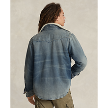 Load image into Gallery viewer, Model wearing POLO Ralph Lauren - L/S 2x1 Denim RL Western Shirt in Squires - back.
