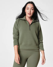 Load image into Gallery viewer, Model wearing Spanx - Air Essentials Half Zip in Clover.
