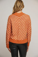 Load image into Gallery viewer, Model wearing Rino &amp; Pelle - Annelie Mock Neck Sweater in Clay Birch.
