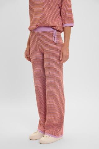 Model wearing  Rino & Pelle - Ariana Straight Leg Pant in Lilac Orange.