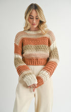 Load image into Gallery viewer, Model wearing Sadie &amp; Sage - Butter Pecan Chunky Sweater Brick Multi.
