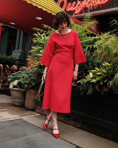 Model wearing Frances Valentine - Whitney Wrap Dress in Red.
