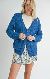 Model wearing Sadie &amp; Sage Eleanor Button Down Cardigan in Electric Blue.