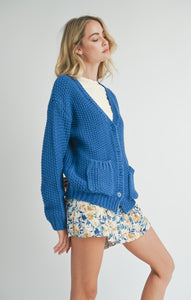 Model wearing Sadie &amp; Sage Eleanor Button Down Cardigan in Electric Blue.