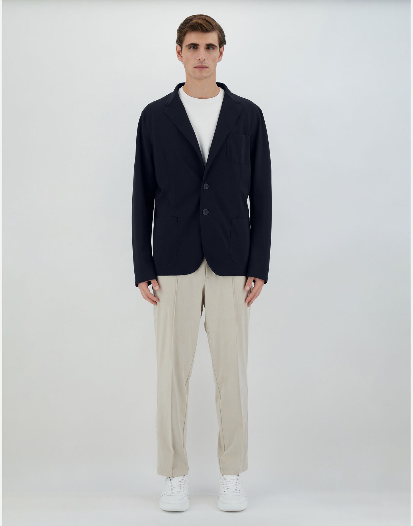 Model wearing Herno - Blazer in Non-Washed Light Scuba in Blue Navy.