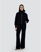 Load image into Gallery viewer, Model wearing Herno Women&#39;s Bomber Jacket in Cashmere in Dark blue.
