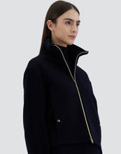 Load image into Gallery viewer, Model wearing Herno Women&#39;s Bomber Jacket in Cashmere in Dark blue.
