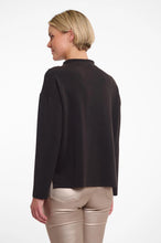 Load image into Gallery viewer, Model wearing Rino &amp; Pelle - Hanne Mock Neck Scuba Top in Black - back.
