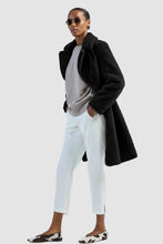 Load image into Gallery viewer, Model wearing Herno Women&#39;s Soft Faux Fur Long Coat in Black.
