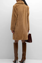 Load image into Gallery viewer, Model wearing Herno Women&#39;s Soft Faux Fur Long Coat in Camel - back.
