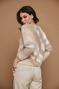 Model wearing Rino & Pelle - Kivi Sweater in Caramel Mix - back.