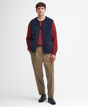 Load image into Gallery viewer, Model wearing Barbour Liddesdale Fleece Vest in Navy.
