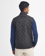 Load image into Gallery viewer, Model wearing Barbour New Lowerdale Quilted Gilet in Black - back.
