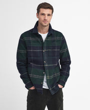 Load image into Gallery viewer, Model wearing Barbour Chapter Tailored Check Overshirt in Green Loch Tartan.
