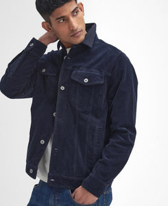 Model wearing Barbour Garment Dyed Cord Overshirt in Navy.