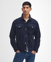 Load image into Gallery viewer, Model wearing Barbour Garment Dyed Cord Overshirt in Navy.
