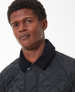 Model wearing Barbour Ashby Quilt in Black.