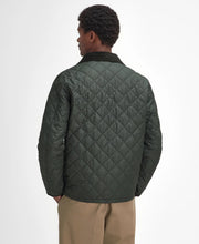 Load image into Gallery viewer, Model wearing Barbour Hornby Quilted Jacket in Sage - back.
