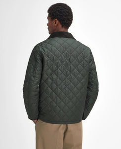 Model wearing Barbour Hornby Quilted Jacket in Sage - back.