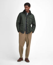 Load image into Gallery viewer, Model wearing Barbour Hornby Quilted Jacket in Sage.
